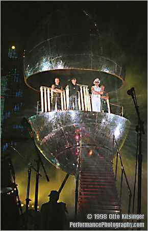 Live U2 concert photo of Larry Mullen Jr, Bono, The Edge, Adam Clayton, inside the lemon