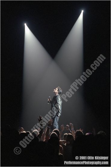 Live U2 concert photo of Bono