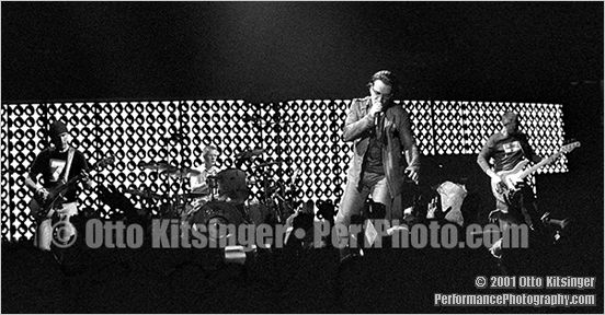 Live U2 concert photo of The Edge, Larry Mullen Jr, Bono, Adam Clayton
