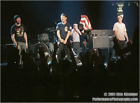 Live U2 concert photo of The Edge, bono, Larry Mullen Jr, Adam Clayton