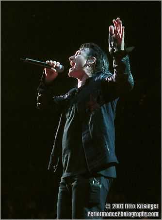 Live U2 concert photo of Bono