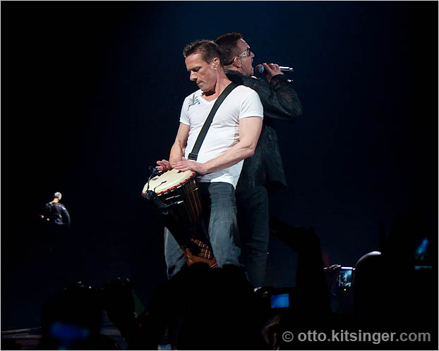 Live U2 concert photo of Larry Mullen Jr, Bono