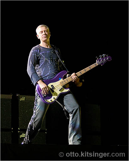 Live U2 concert photo of Adam Clayton