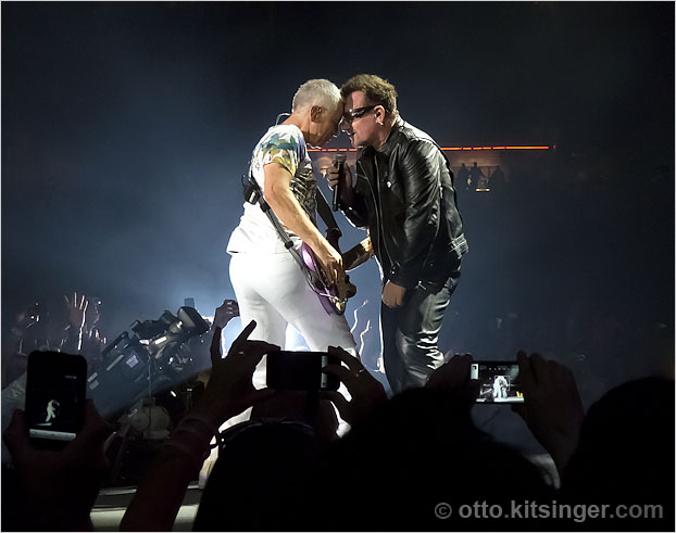 Live U2 concert photo of Adam Clayton, Bono