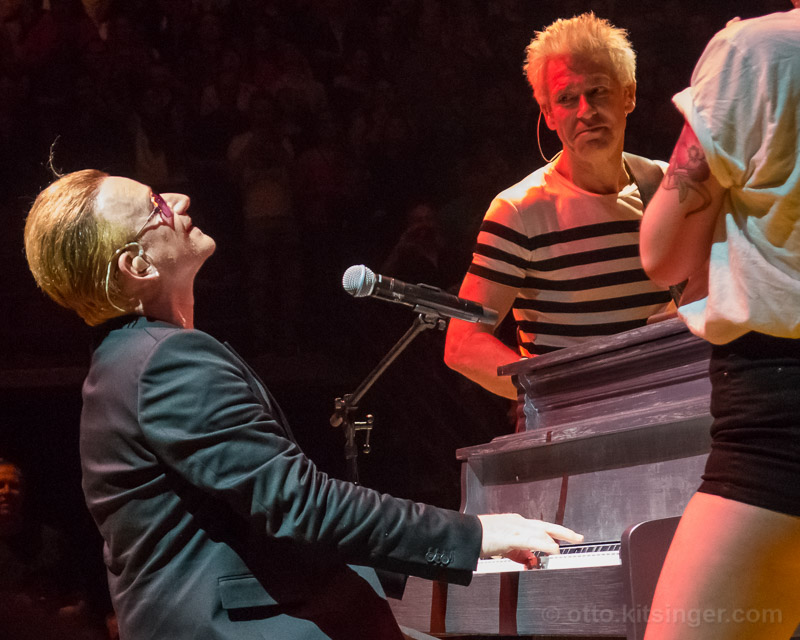 Live concert photo of Bono, Adam Clayton