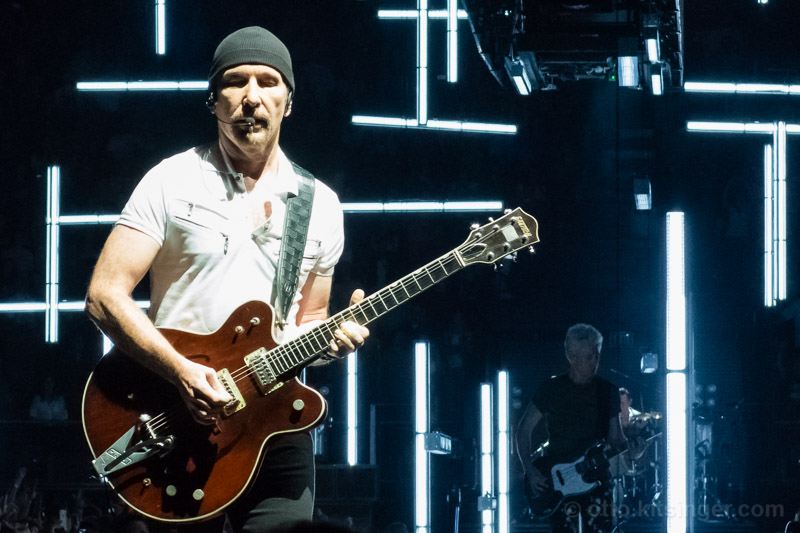 Live concert photo of The Edge, Adam Clayton