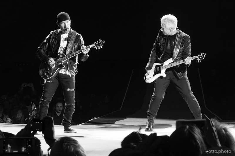 Live concert photo of The Edge, Adam Clayton